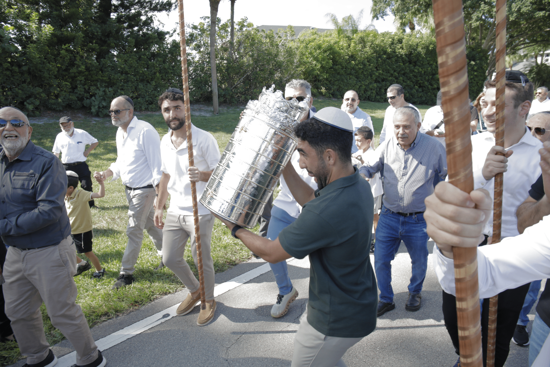 An open Torah scroll with silver yad